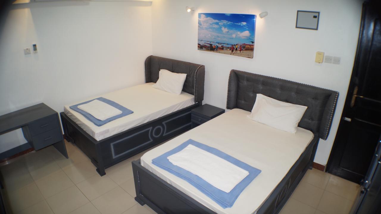 Econo Lodge دار السلام المظهر الخارجي الصورة